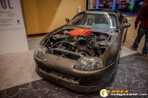 Race cars, performance parts, new products, and motorsports technology on display at PRI Show 2025 in Indianapolis, Indiana.