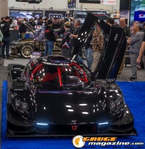 Race cars, performance parts, new products, and motorsports technology on display at PRI Show 2025 in Indianapolis, Indiana.