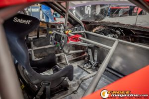 Race cars, performance parts, new products, and motorsports technology on display at PRI Show 2025 in Indianapolis, Indiana.
