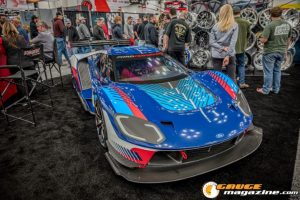 Race cars, performance parts, new products, and motorsports technology on display at PRI Show 2025 in Indianapolis, Indiana.