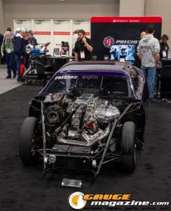 Race cars, performance parts, new products, and motorsports technology on display at PRI Show 2025 in Indianapolis, Indiana.