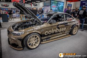 Race cars, performance parts, new products, and motorsports technology on display at PRI Show 2025 in Indianapolis, Indiana.