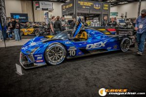 Race cars, performance parts, new products, and motorsports technology on display at PRI Show 2025 in Indianapolis, Indiana.