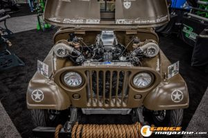 Race cars, performance parts, new products, and motorsports technology on display at PRI Show 2025 in Indianapolis, Indiana.