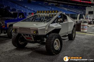 Race cars, performance parts, new products, and motorsports technology on display at PRI Show 2025 in Indianapolis, Indiana.