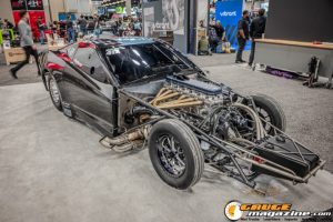 Race cars, performance parts, new products, and motorsports technology on display at PRI Show 2025 in Indianapolis, Indiana.