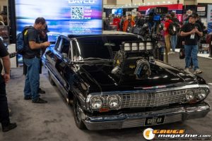Race cars, performance parts, new products, and motorsports technology on display at PRI Show 2025 in Indianapolis, Indiana.