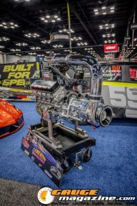 Race cars, performance parts, new products, and motorsports technology on display at PRI Show 2025 in Indianapolis, Indiana.