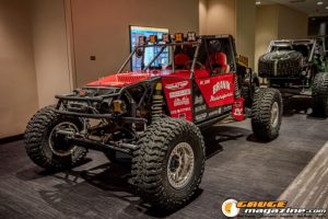 Race cars, performance parts, new products, and motorsports technology on display at PRI Show 2025 in Indianapolis, Indiana.