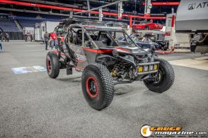 Race cars, performance parts, new products, and motorsports technology on display at PRI Show 2025 in Indianapolis, Indiana.