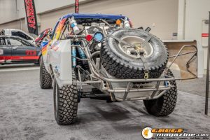 Race cars, performance parts, new products, and motorsports technology on display at PRI Show 2025 in Indianapolis, Indiana.