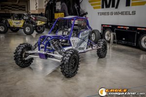 Race cars, performance parts, new products, and motorsports technology on display at PRI Show 2025 in Indianapolis, Indiana.