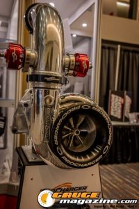 Race cars, performance parts, new products, and motorsports technology on display at PRI Show 2025 in Indianapolis, Indiana.