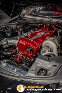 Race cars, performance parts, new products, and motorsports technology on display at PRI Show 2025 in Indianapolis, Indiana.