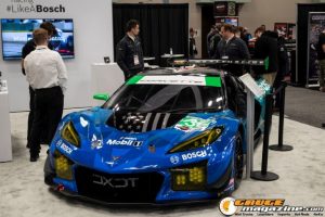 Race cars, performance parts, new products, and motorsports technology on display at PRI Show 2025 in Indianapolis, Indiana.