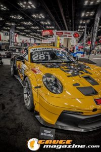 Race cars, performance parts, new products, and motorsports technology on display at PRI Show 2025 in Indianapolis, Indiana.