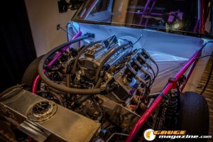 Race cars, performance parts, new products, and motorsports technology on display at PRI Show 2025 in Indianapolis, Indiana.