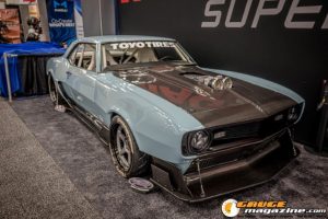 Race cars, performance parts, new products, and motorsports technology on display at PRI Show 2025 in Indianapolis, Indiana.