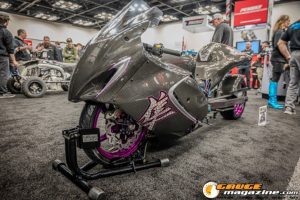 Race cars, performance parts, new products, and motorsports technology on display at PRI Show 2025 in Indianapolis, Indiana.