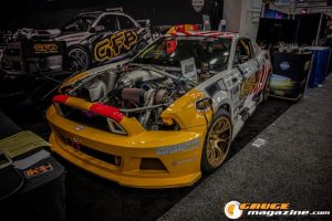 Race cars, performance parts, new products, and motorsports technology on display at PRI Show 2025 in Indianapolis, Indiana.