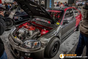 Race cars, performance parts, new products, and motorsports technology on display at PRI Show 2025 in Indianapolis, Indiana.