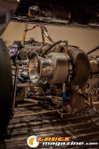 Race cars, performance parts, new products, and motorsports technology on display at PRI Show 2025 in Indianapolis, Indiana.