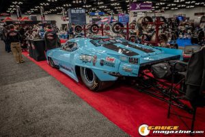 Race cars, performance parts, new products, and motorsports technology on display at PRI Show 2025 in Indianapolis, Indiana.