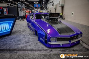 Race cars, performance parts, new products, and motorsports technology on display at PRI Show 2025 in Indianapolis, Indiana.