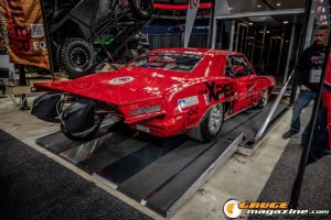 Race cars, performance parts, new products, and motorsports technology on display at PRI Show 2025 in Indianapolis, Indiana.