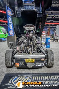 Race cars, performance parts, new products, and motorsports technology on display at PRI Show 2025 in Indianapolis, Indiana.