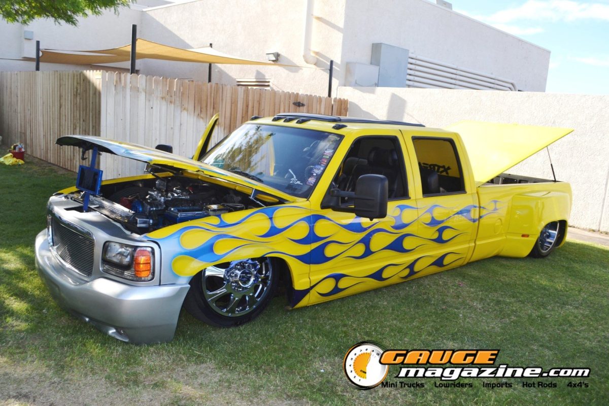 forbidden-fantasy-show-n-shine-2026-101-yellow-gmc-sierra-flame-paint-slammed