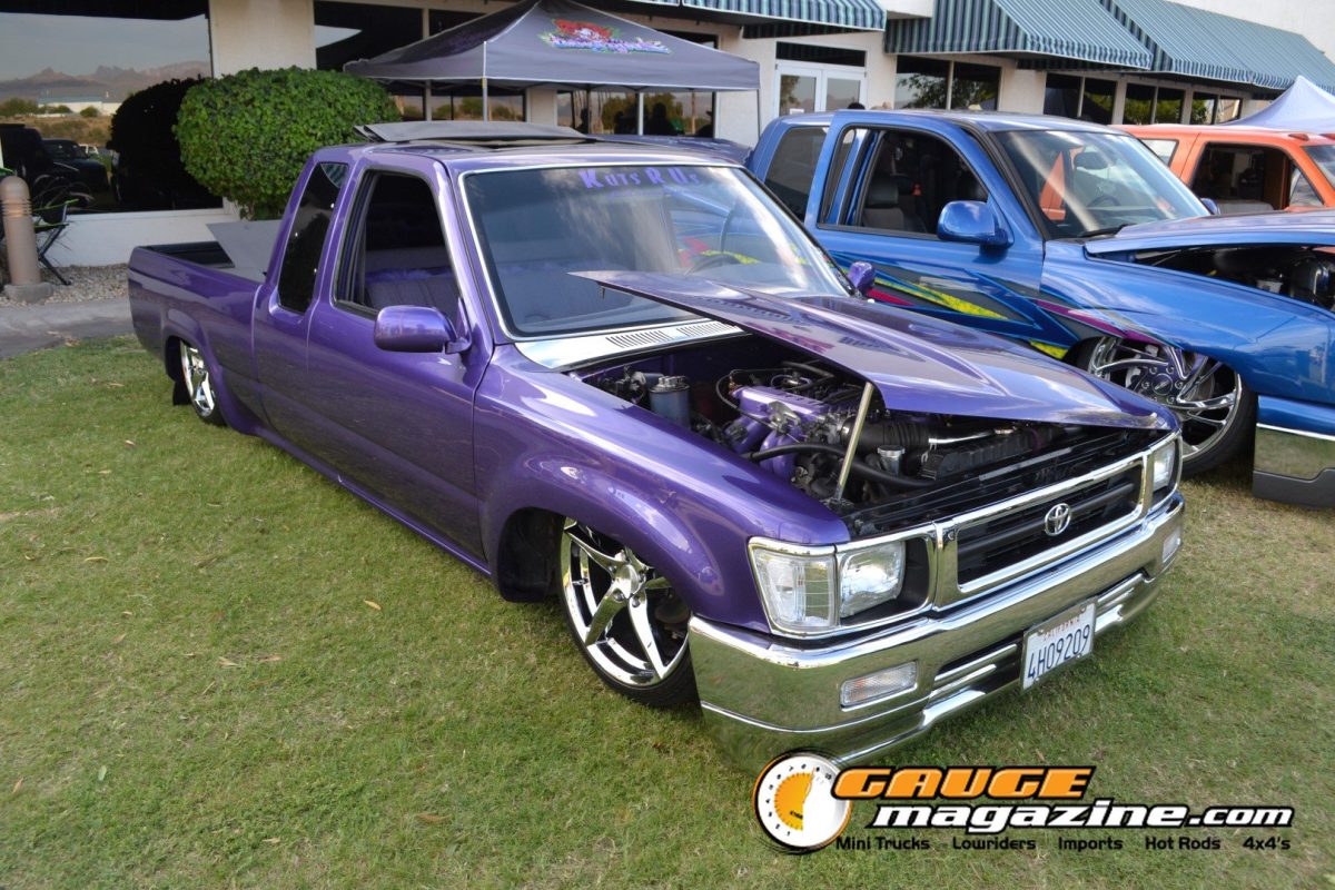 forbidden-fantasy-show-n-shine-2026-111-purple-toyota-pickup-engine-bay-slammed