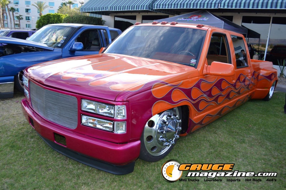 forbidden-fantasy-show-n-shine-2026-109-orange-chevrolet-silverado-flame-paint-slammed