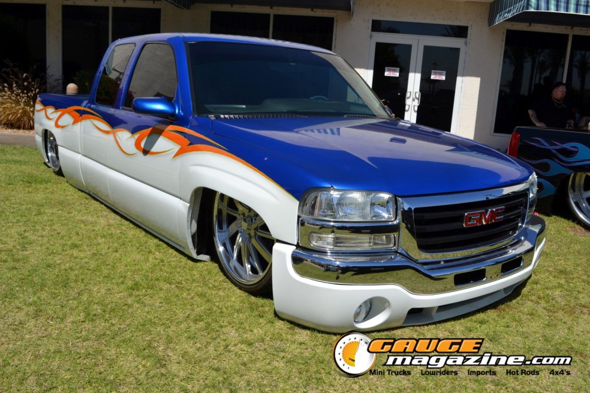 forbidden-fantasy-show-n-shine-2026-037-blue-silver-gmc-sierra-flame-paint-slammed