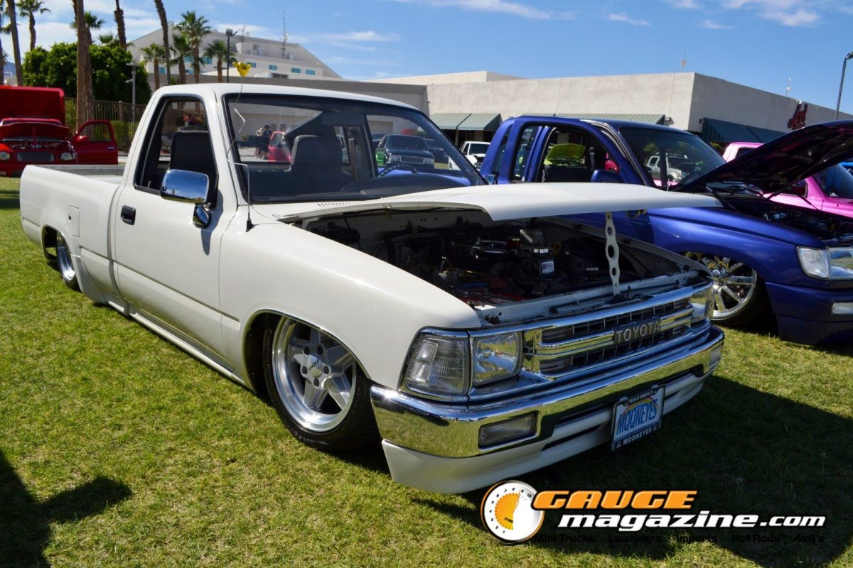 forbidden-fantasy-show-n-shine-2026-063-white-toyota-pickup-engine-bay-slammed
