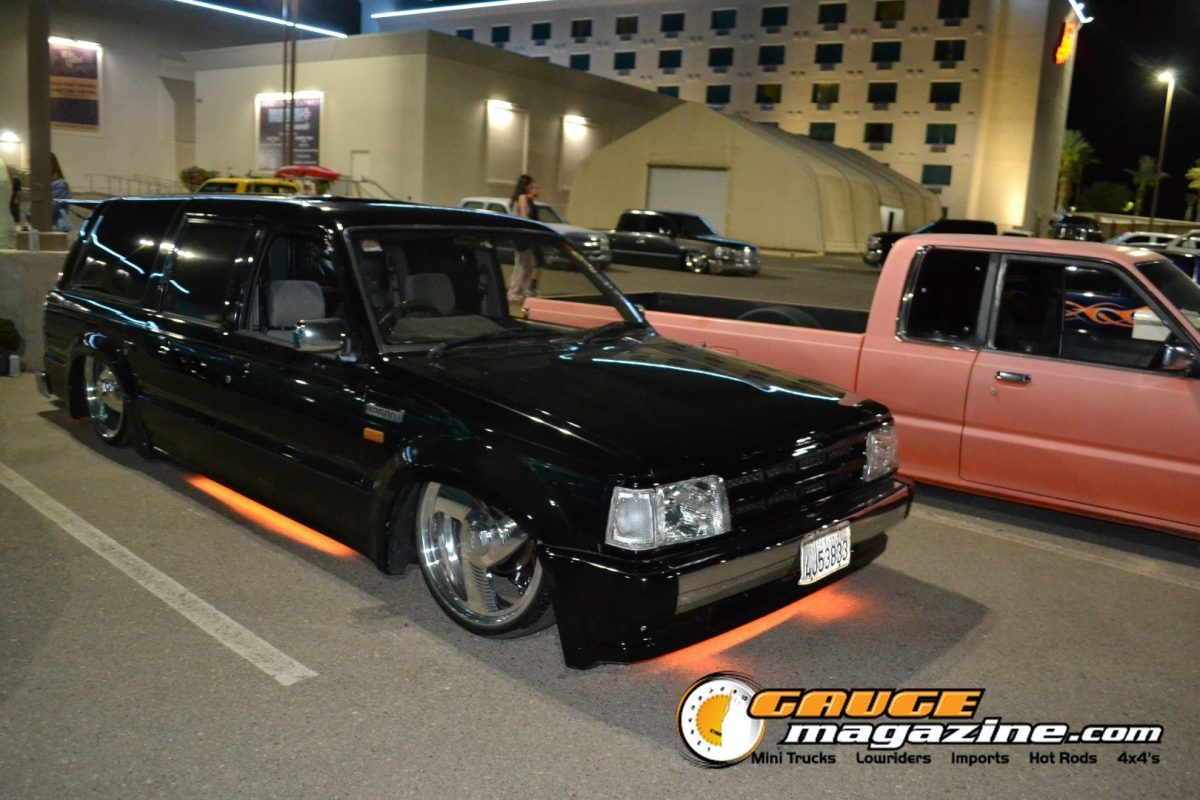 forbidden-fantasy-show-n-shine-2026-128-black-custom-4-door-mazda-underglow-night