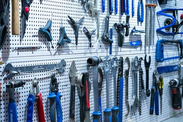 Organized garage workspace with tools stored within easy reach