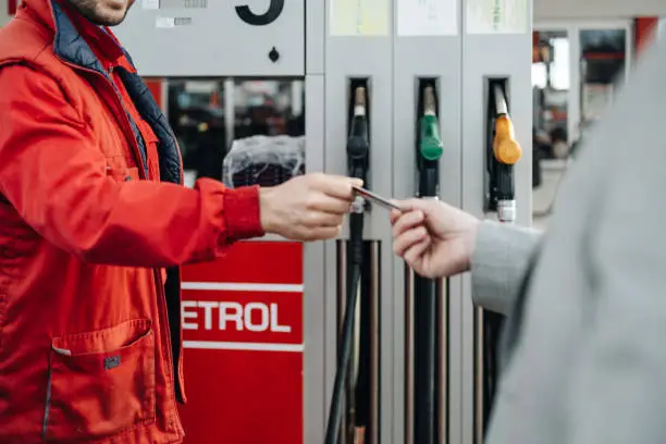 Fleet manager using fuel cards to monitor business fuel expenses