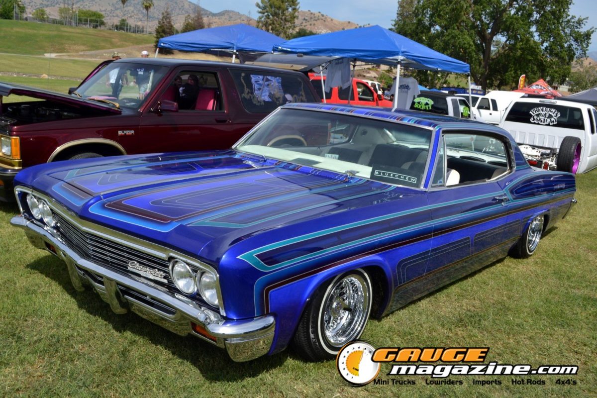 Blue and purple Chevrolet Impala lowrider at Danger Zone Truck and Car Show 2026