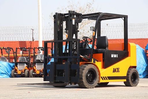 electric forklift operating in an industrial warehouse