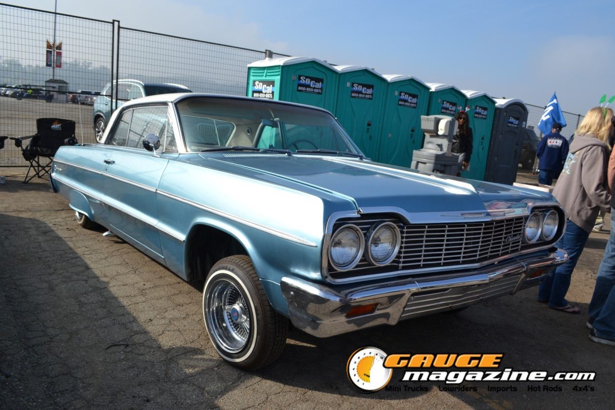 mooneyes-christmas-party-2025-049-blue-chevrolet-impala-lowrider