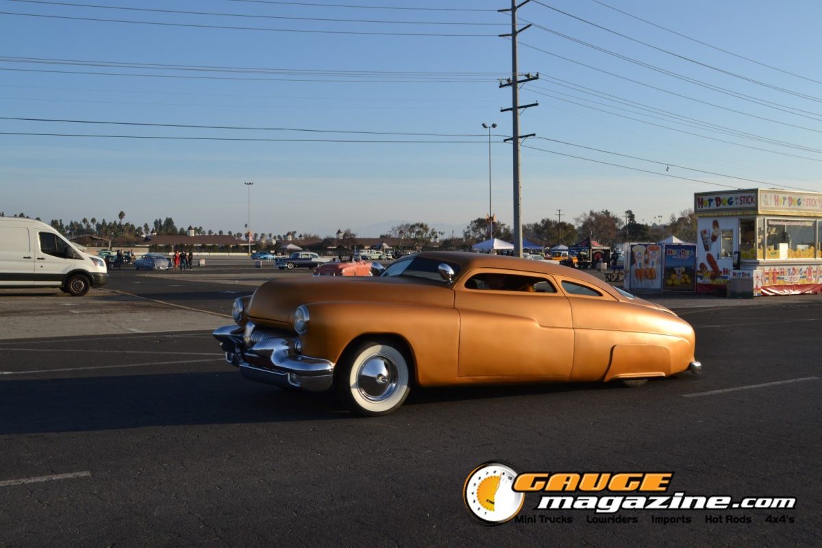 mooneyes-christmas-party-2025-338-copper-chopped-mercury-lead-sled-driving