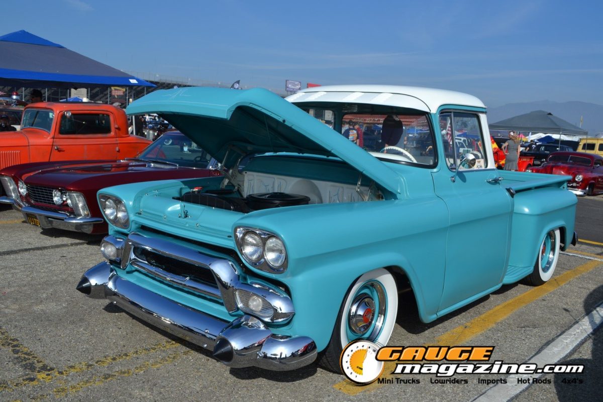 mooneyes-christmas-party-2025-158-turquoise-chevrolet-task-force-pickup-engine-bay