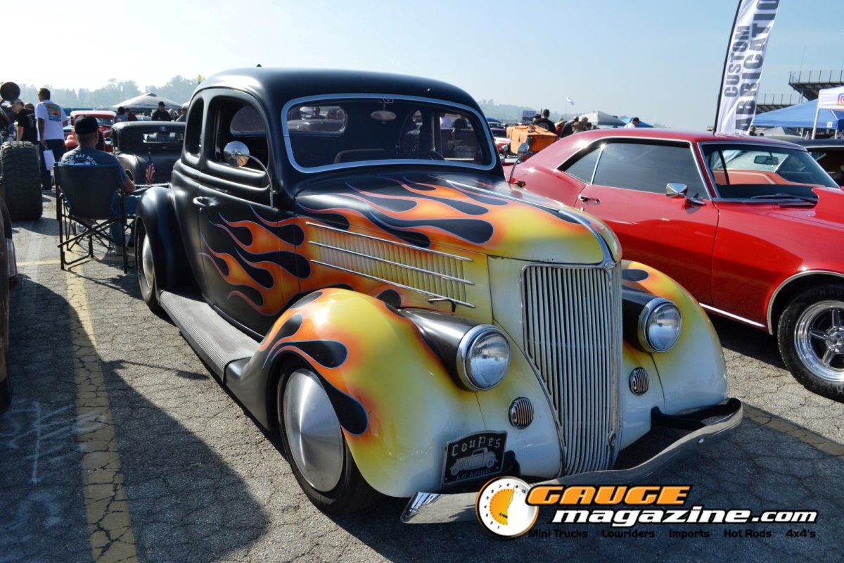 mooneyes-christmas-party-2025-210-black-flame-painted-1930s-hot-rod