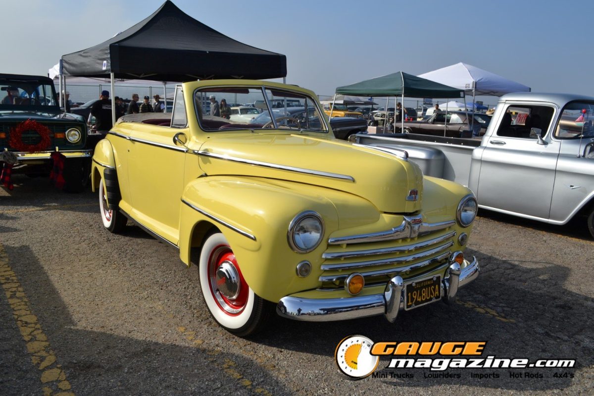 mooneyes-christmas-party-2025-083-yellow-1940s-chevrolet-coupe