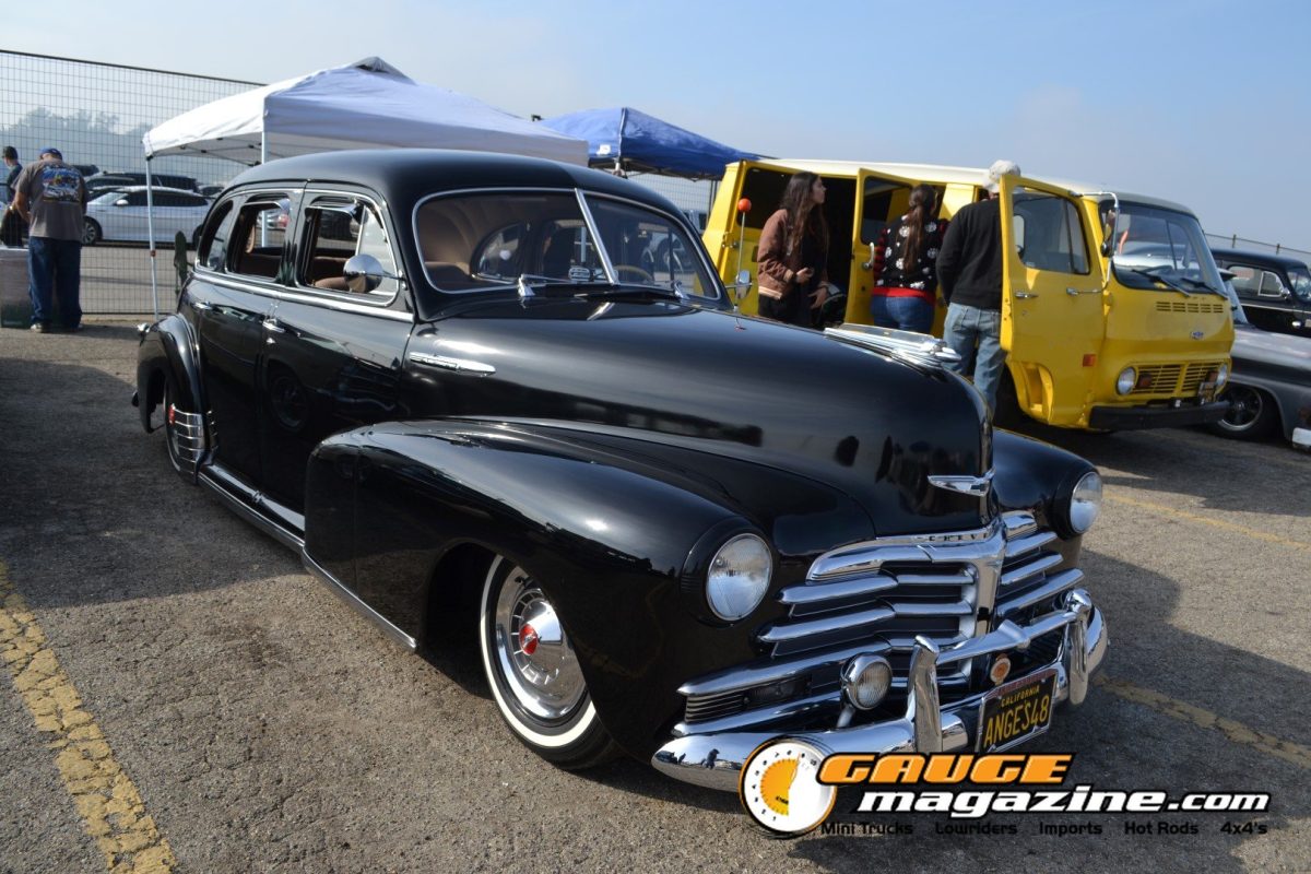 mooneyes-christmas-party-2025-039-black-1940s-chevrolet-fleetline-style-sedan