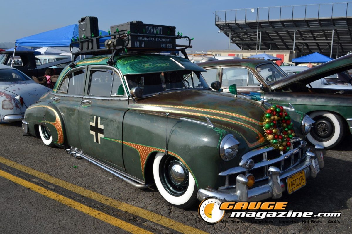 mooneyes-christmas-party-2025-012-green-custom-classic-sedan-christmas-display