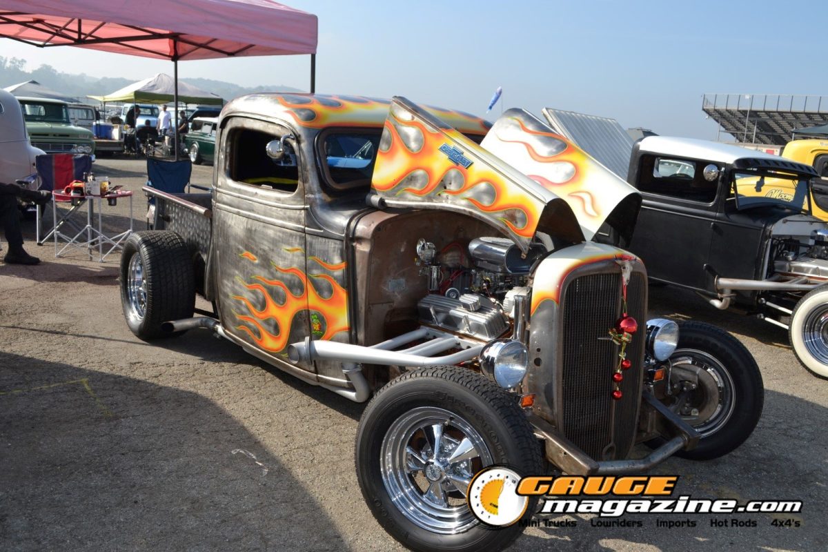 mooneyes-christmas-party-2025-149-flame-painted-rat-rod-pickup-engine-bay