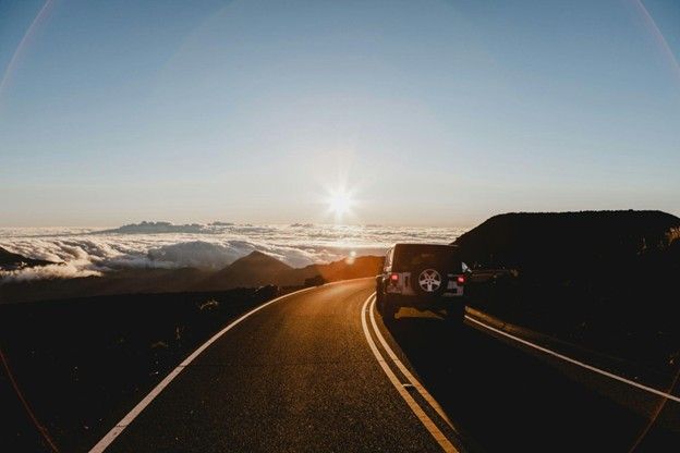 Travelers enjoying music and entertainment during a weekend road trip